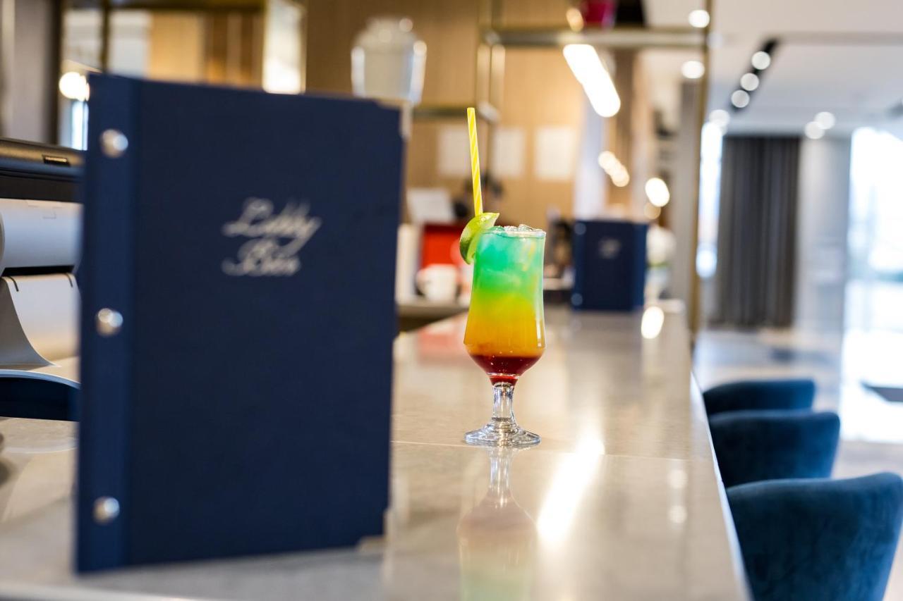 锡比乌机场美居酒店 外观 照片